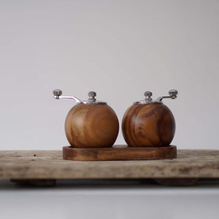 Salt and pepper grinder with wooden stand