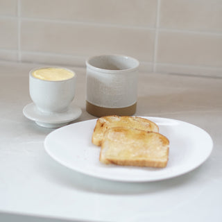 cream butter dish with toast