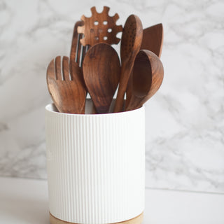 wooden kitchen utensil set with ceramic pot