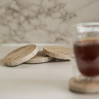 3 round travertine coasters