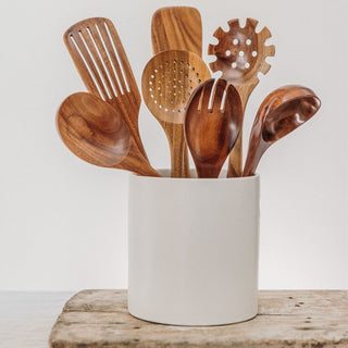 wooden kitchen utensil set with ceramic pot