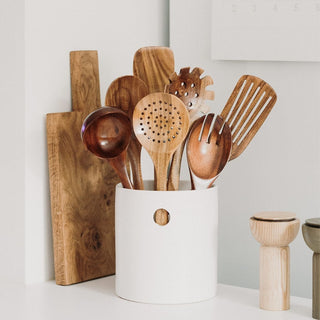 wooden kitchen utensil set with ceramic pot